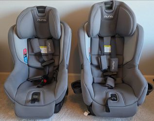 Pair of Nuna RAVA Convertible Car Seats – Threaded Gray (Clean, Accident-Free)