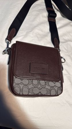Coach crossbody bag and matching wallet.