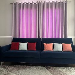 2 Blue Sofas With Ottoman 