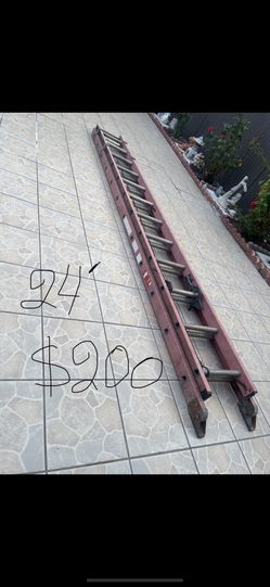 Excellent Condition, 24 And 28 Feet Fiberglass Extension Ladders
