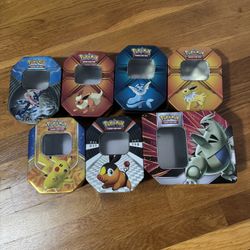 Pokemon tins. Sold as set 