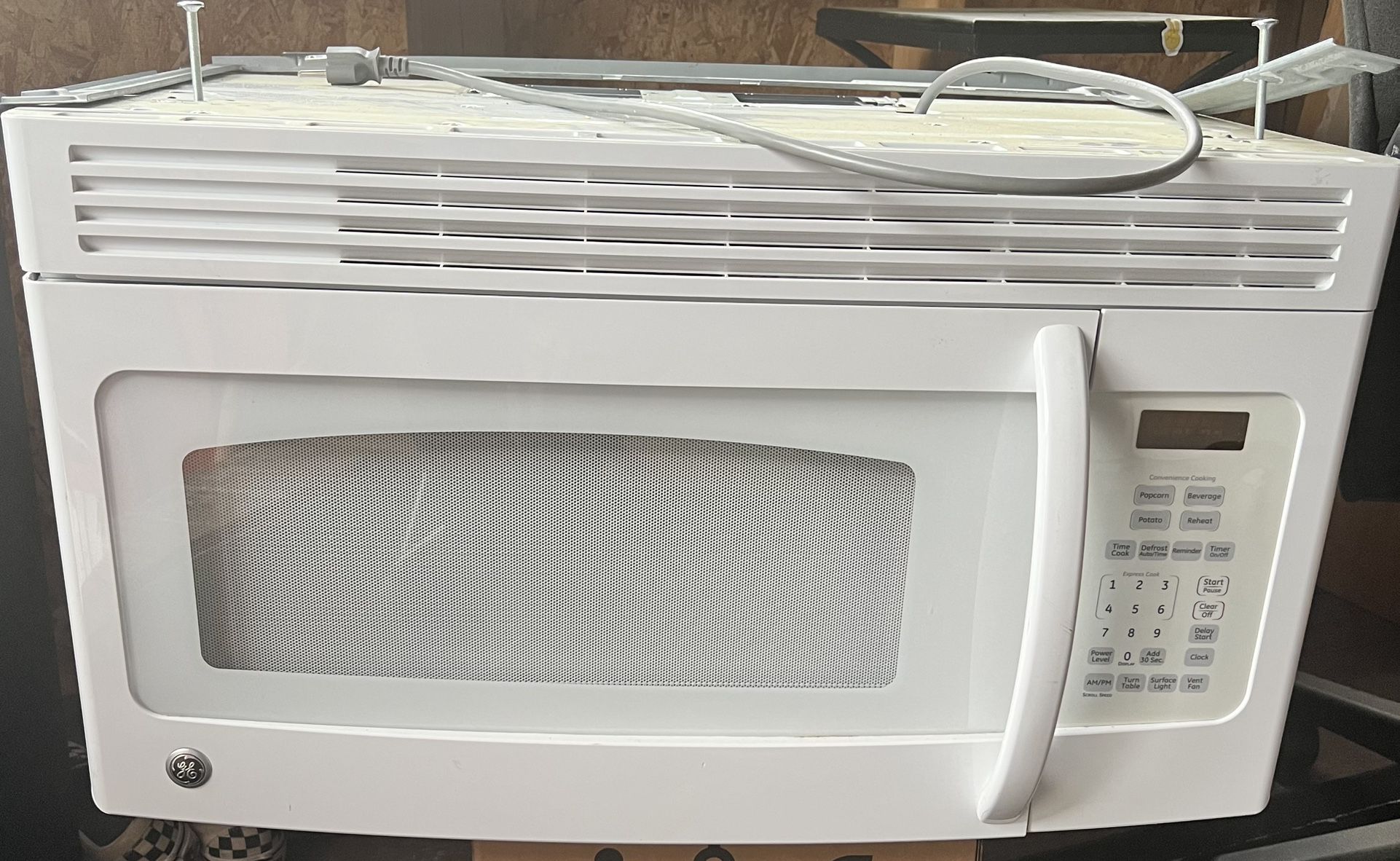 GE Over-the-Range Microwave/ White