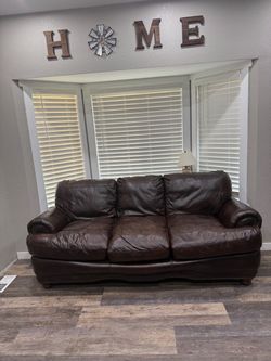 Leather couch, chair and ottoman