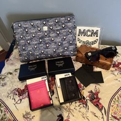 Lot Of Mcm Sign Pouch & 2 Wallets &sunglasses W/case.                       &suhttps://https://offerup.co/faYXKzQFnY?$deeplink_path=/redirect/