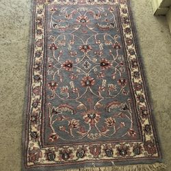 Heavy wool area rug