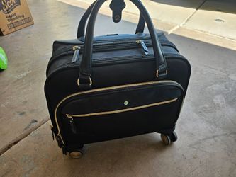 Samsonite  Carry on roller bag.