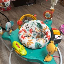 Jumper, height can be adjusted, seat turns all the way around. Asking