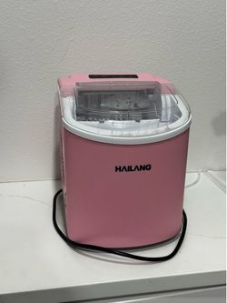 Pink countertop ice maker