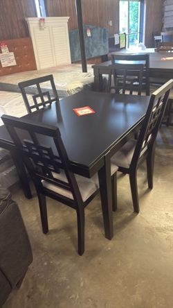 Brand new table and four chairs only one to sell for 399 hurry, brand, new table and four chair chairs for three