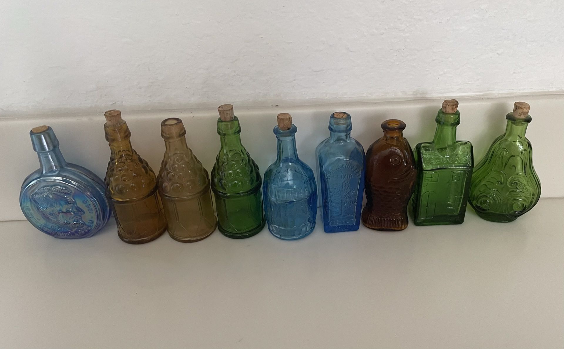 9-Vintage Colored Glass Bottles 