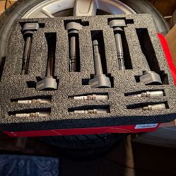 OEM coil packs and spark plugs for a Honda ridgeline