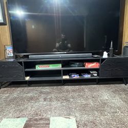 Black tv stand/entertainment center