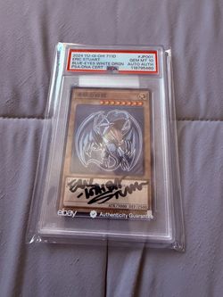 PSA Signed Eric Stuart Yu-Gi-Oh! TCG Blue Eyes White Dragon 711D-JP001 (2024)