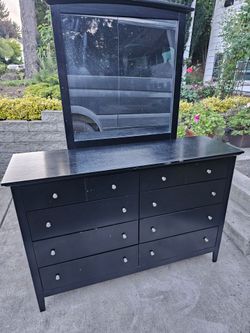 dresser with a mirror