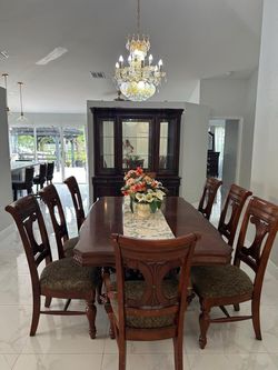Dark Wood Dining Table with 8 Chairs
