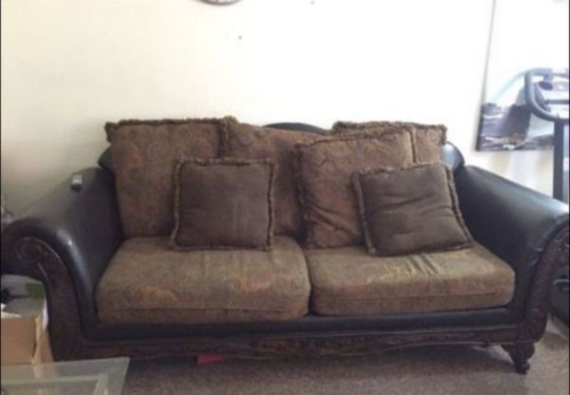 Sofa and love seat with coffee tables and end tables