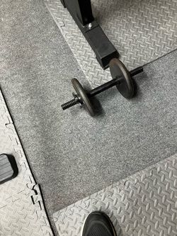 Olympic bar and standard one inch plates Weights for sale