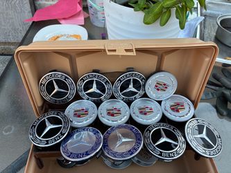 “lot of car wheel center caps – Mercedes-Benz, Cadillac, Porsche, Audi, Honda, SRT & GMC cash only.”