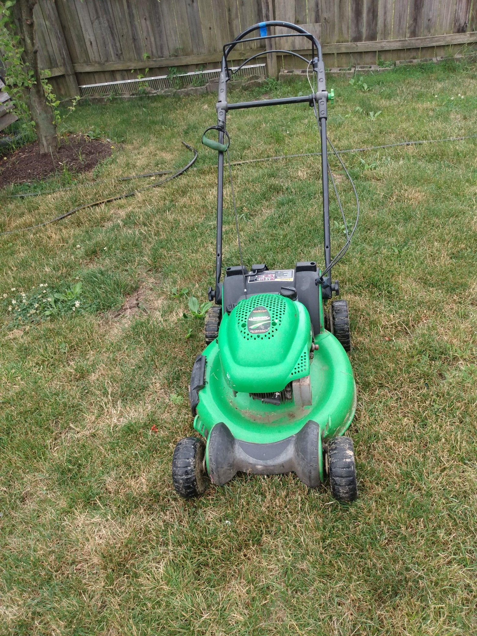 Self propelled lawn mower