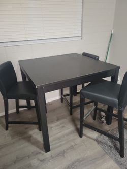 Table, three chairs