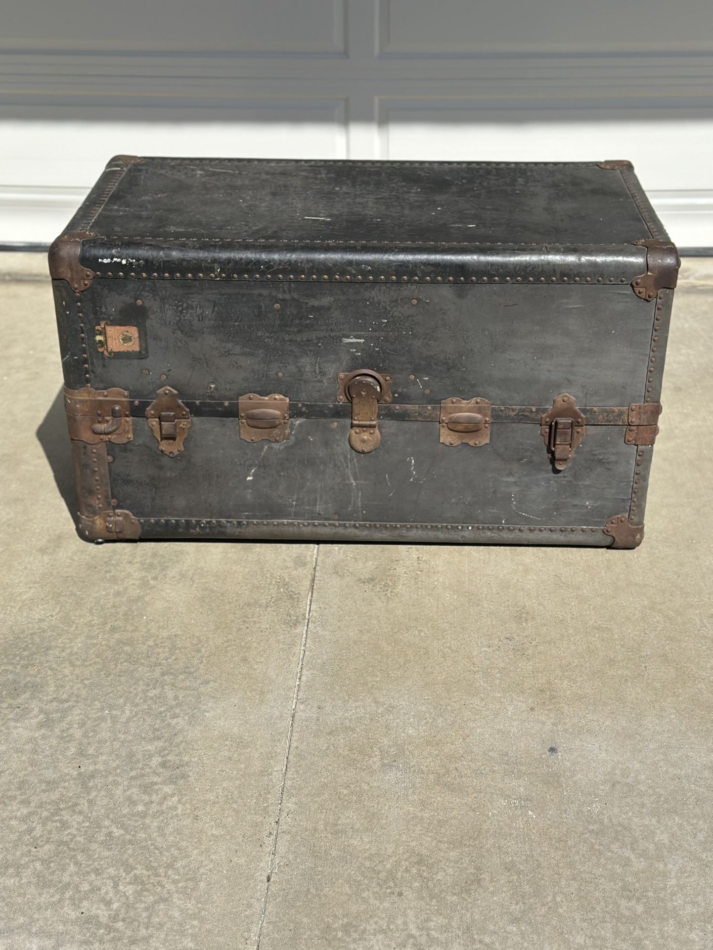 Vintage Wheary Steamer Trunk