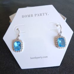 Bomb Party November birthday 'Yes Indeed' blue topaz silver rhodium dangle earrings NEW 