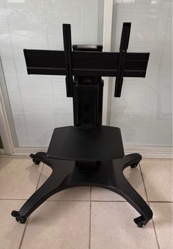Heavy duty mobile tv stand with lockable wheels