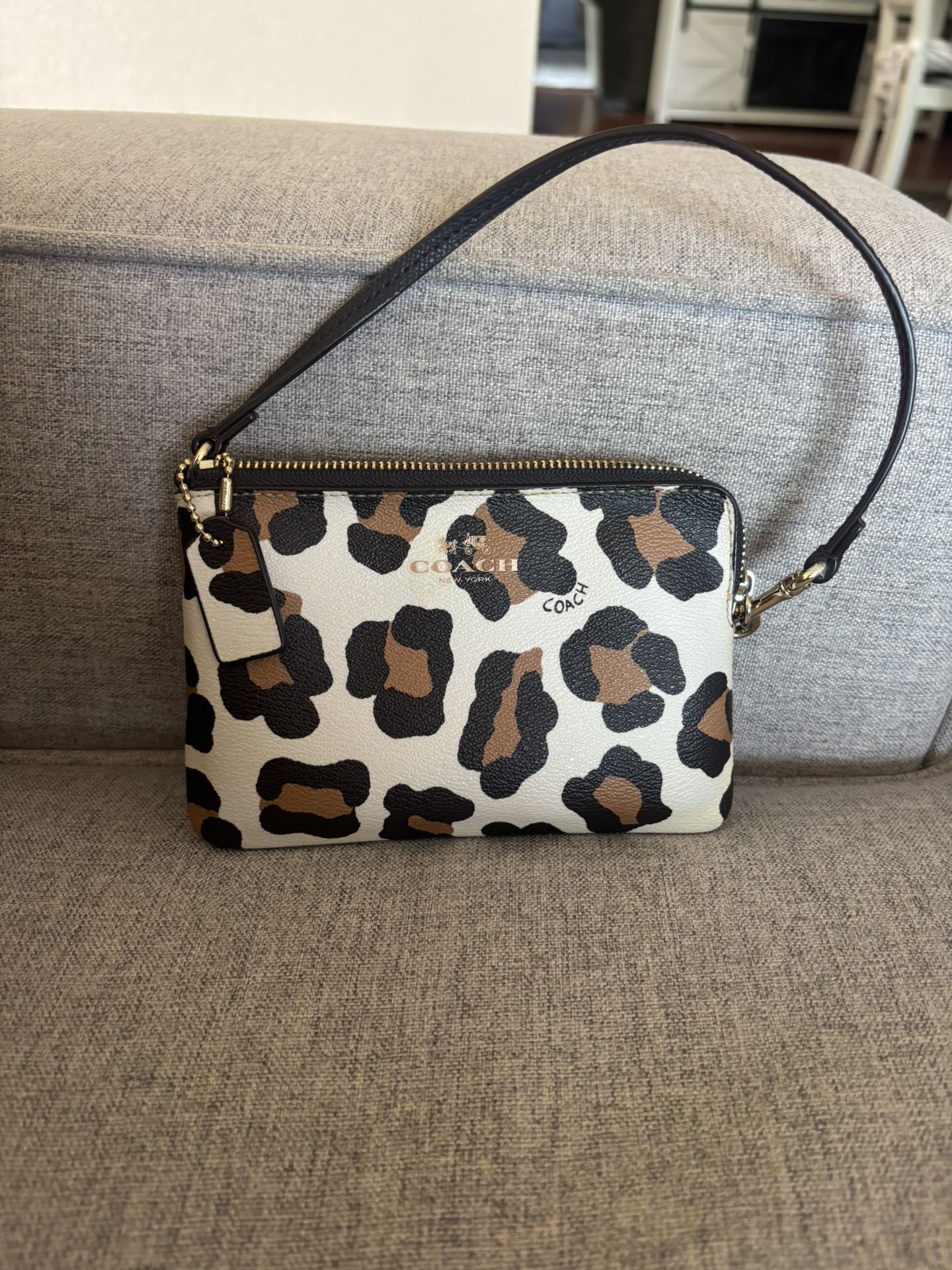 cheetah print coach wristlet 
