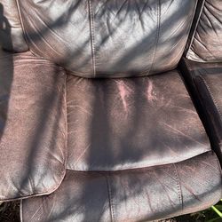 Free faux leather reclining love seat