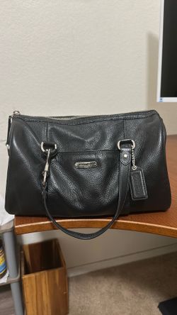 Black Coach purse with ounk and gray coach scarf