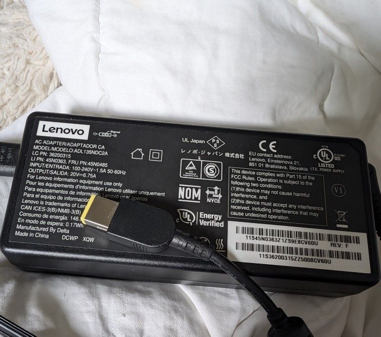 Lenova ac adapter 135W slim tip Thinkpad. Like new condition