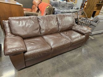 Elegant Leather Sofa with Plush Cushions