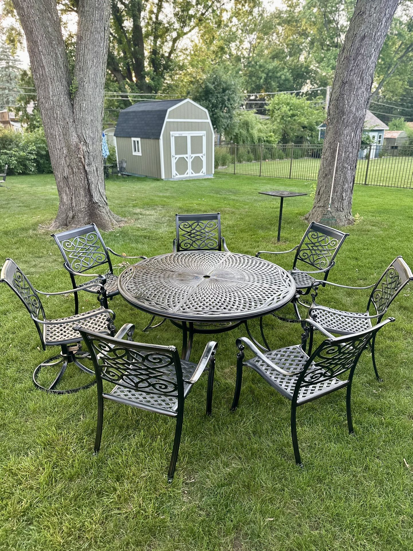 Large Cast Aluminum 10pc Patio Set, Table Is 60” Diameter, 7 Chairs, 2 Of Them Are Swivel, 2 Foot Ottomans, Freshly Painted, Looks Like New