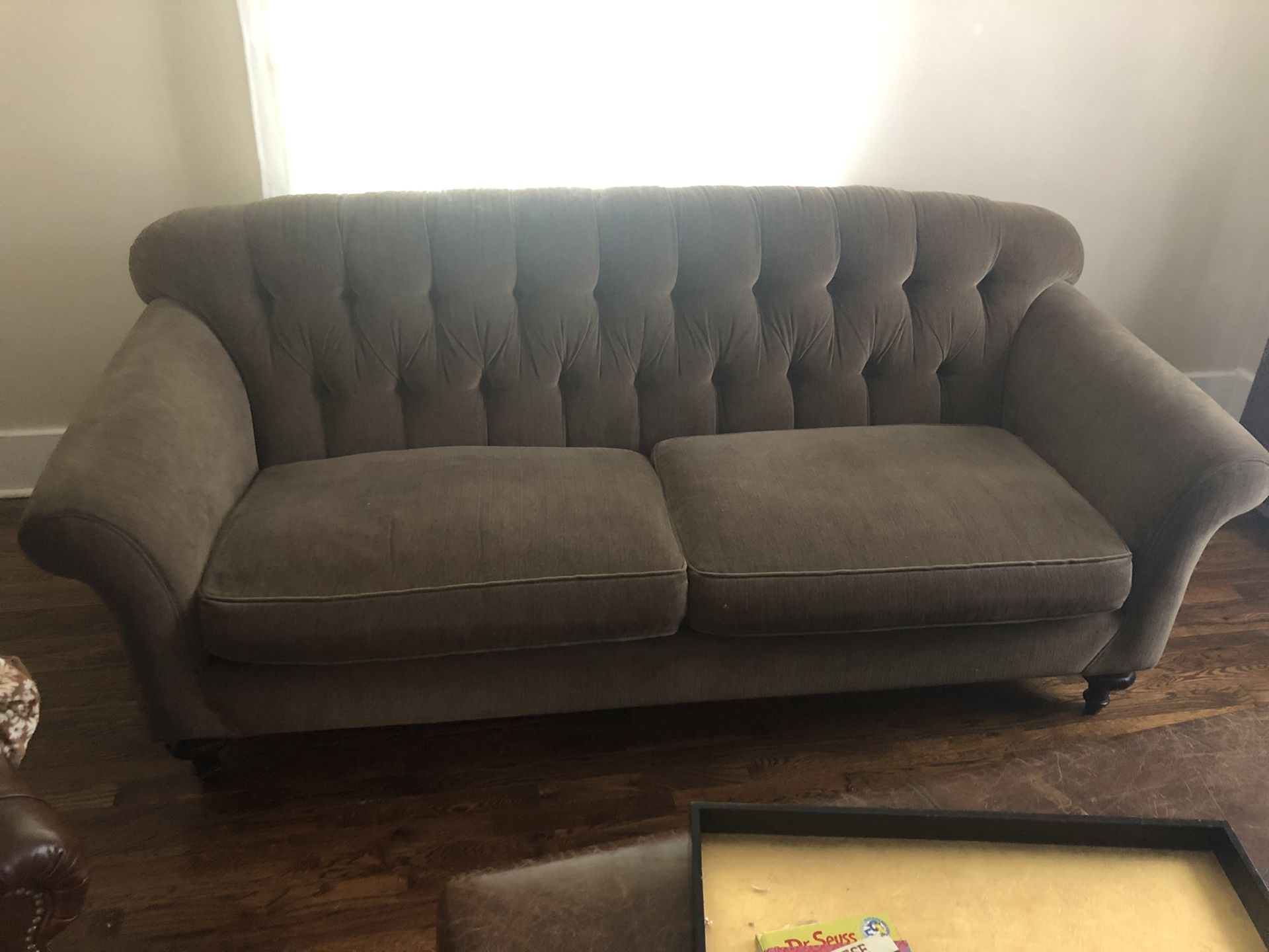 Arhaus couch. Down wrapped olive green . Great condition. Bought new . Only owner.