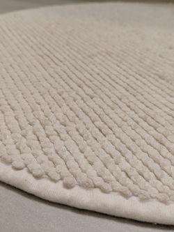 2 fluffy bathroom rugs