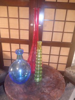 Beautiful glass decanter and vases
