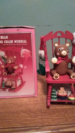 Vintage Musical teddy bear rocking chair. Plays Christmas Melody And Rocks When U Wind It Up.