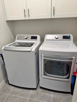 One year old washer and electric dryer