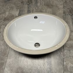 American Standard 0495.300 Ovalyn 15" Undermount Porcelain Bathroom Sink - White. Sun Valley Pick Up.
