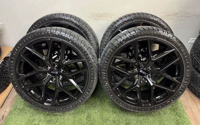 New 24 inch Gm style wheels wrapped in Lexani 305/35r24 tires