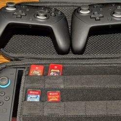 Switch 2 w/ Case, (2) Switch 2 Pro Controllers, (4) Games