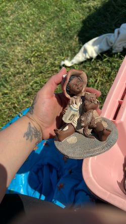 Resin Child Figurine with Cat and Bottle