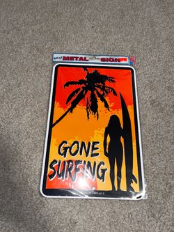 Surfer girl metal door sign “gone surfing”