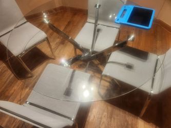 Round glass table with 4 chairs all chrome legs