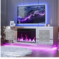 IKIFLY Mirrored Fireplace TV Stand for 65+ inch TV, Mirrored TV Stand with Crushed Diamond & LED Light, Silver Media Entertainment Center with Firepla