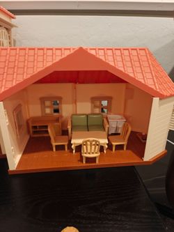 There are four sets in total.Calico Critters Red Roof Country Home with Furniture and Figures