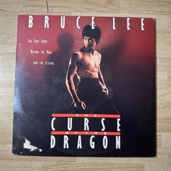 BRUCE LEE - THE CURSE OF THE DRAGON - LASERDISC - LD - 1993  USED DISC IS IN GREAT SHAPE. PLAYED ONCE.  COVER HAS ONE SPOT WITH DAMAGE MAY HAVE CORNER