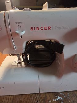 Used singer sewing machine. The thread tension needs to be calibrated. Other than that workers perfectly. $50 OBO