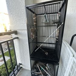 LARGE BIRD CAGE WITH BED TOYS ETC
