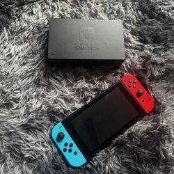 Selling my original Nintendo switch in excellent, barely used condition. All accessories named are original and fully functional. 